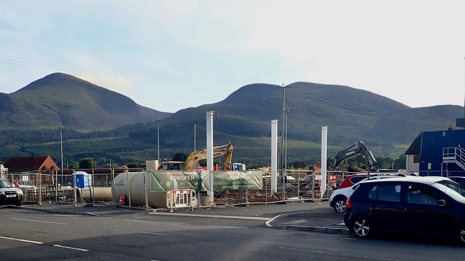 Service station forecourt under construction with plant and canopy columns